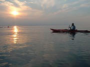 Kilby paddling off into the sunset.